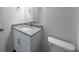Close-up of sink with granite countertop and modern fixtures in bathroom at 16450 Se 57Th Pl, Ocklawaha, FL 32179