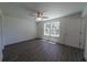 Bedroom with ceiling fan, natural light, and spacious layout at 16450 Se 57Th Pl, Ocklawaha, FL 32179