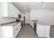Bright kitchen features granite countertops, stainless steel appliances, and ample cabinet space at 16450 Se 57Th Pl, Ocklawaha, FL 32179