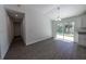 Living room with sliding glass doors to the exterior that provide great natural light at 16450 Se 57Th Pl, Ocklawaha, FL 32179