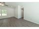 Open-concept living room with great natural light and neutral wall paint at 16450 Se 57Th Pl, Ocklawaha, FL 32179