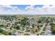 Aerial view of a large residential neighborhood with a variety of homes at 17606 Se 93Rd Butler Ct, The Villages, FL 32162