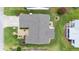 Direct overhead aerial view of a single Gathering home with a large yard at 17606 Se 93Rd Butler Ct, The Villages, FL 32162