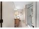 Clean bathroom with a large shower and granite vanity at 17606 Se 93Rd Butler Ct, The Villages, FL 32162