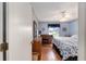 Guest bedroom with a queen-size bed and nautical theme at 17606 Se 93Rd Butler Ct, The Villages, FL 32162