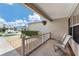 Inviting front porch with seating and landscaping at 17606 Se 93Rd Butler Ct, The Villages, FL 32162