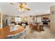 Open kitchen with island and stainless steel appliances at 17606 Se 93Rd Butler Ct, The Villages, FL 32162