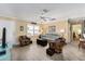 Relaxing living room with light walls and comfy furniture at 17606 Se 93Rd Butler Ct, The Villages, FL 32162