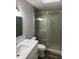 Bathroom with walk-in shower and skylight at 1936 Se 37Th Court Cir, Ocala, FL 34471