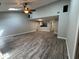 Spacious living room with vaulted ceilings, wood-look floors, and natural light at 1936 Se 37Th Court Cir, Ocala, FL 34471