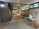 Covered patio with concrete flooring, outdoor lighting, and additional features at 1936 Se 37Th Court Cir, Ocala, FL 34471