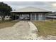 Poolside pavilion featuring a covered seating area and pool access at 1936 Se 37Th Court Cir, Ocala, FL 34471