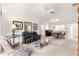 Inviting living room featuring vaulted ceiling, comfortable seating, and an open floor plan at 2630 Dunbar Ave, The Villages, FL 32162