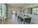 Bright dining area with view into the living room and kitchen at 4062 Nw 44Th Cir, Ocala, FL 34482