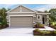 One-story home with stone accents and a two-car garage at 4062 Nw 44Th Cir, Ocala, FL 34482