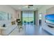 Living room with view of backyard and sliding glass doors at 4062 Nw 44Th Cir, Ocala, FL 34482