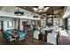 Spacious clubhouse with comfortable seating areas and a large dining table at 4068 Nw 44Th Cir, Ocala, FL 34482