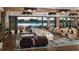 Elegant lobby with comfortable seating overlooking a lake at 4068 Nw 44Th Cir, Ocala, FL 34482