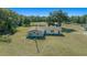 Aerial view of a long ranch-style home on a spacious lot at 4248 Ne 175Th Street Rd, Citra, FL 32113
