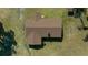 Overhead view of a home's brown roof, showcasing its unique shape and design at 4248 Ne 175Th Street Rd, Citra, FL 32113