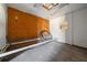 Unfinished interior with plywood walls and flooring at 4248 Ne 175Th Street Rd, Citra, FL 32113
