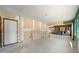 Unfinished basement area with a door and ample space for renovation at 4248 Ne 175Th Street Rd, Citra, FL 32113