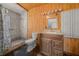Bathroom with walk-in shower and updated vanity at 4248 Ne 175Th Street Rd, Citra, FL 32113