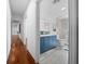 Modern bathroom with a blue vanity and walk-in shower at 4248 Ne 175Th Street Rd, Citra, FL 32113