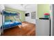 Fun bedroom with hardwood floors and a bunk bed at 4248 Ne 175Th Street Rd, Citra, FL 32113