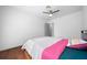 Serene bedroom with hardwood floors and a queen-size bed at 4248 Ne 175Th Street Rd, Citra, FL 32113