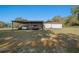 Spacious covered carport offering parking for multiple vehicles at 4248 Ne 175Th Street Rd, Citra, FL 32113