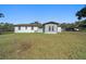 Ranch style home with double doors and a large yard at 4248 Ne 175Th Street Rd, Citra, FL 32113