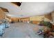 Large room with exposed ceiling, walls, and floor at 4248 Ne 175Th Street Rd, Citra, FL 32113