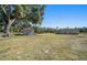 Property features a shed and large barn with fenced area at 4248 Ne 175Th Street Rd, Citra, FL 32113