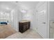 Double vanity bathroom with view into bedroom at 5826 Sw 83Rd Ln, Ocala, FL 34476