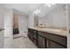 Modern bathroom with double vanity and soaking tub at 5826 Sw 83Rd Ln, Ocala, FL 34476