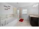 Elegant bathroom with soaking tub, walk-in shower, and double vanity at 5826 Sw 83Rd Ln, Ocala, FL 34476