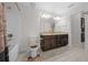 Clean bathroom with double vanity and shower/tub combo at 5826 Sw 83Rd Ln, Ocala, FL 34476