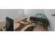 Bright bedroom with TV, carpet, and a colorful rug at 5826 Sw 83Rd Ln, Ocala, FL 34476