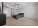 Primary bedroom with ceiling fan and ensuite bathroom access at 5826 Sw 83Rd Ln, Ocala, FL 34476