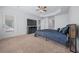 Primary bedroom with fireplace and patio door access at 5826 Sw 83Rd Ln, Ocala, FL 34476