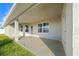 Covered patio with concrete flooring and access to the backyard at 5826 Sw 83Rd Ln, Ocala, FL 34476