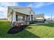 House exterior showcasing a one-story home with landscaping and a large yard at 5826 Sw 83Rd Ln, Ocala, FL 34476