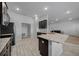 Modern kitchen featuring granite countertops and stainless steel appliances at 5826 Sw 83Rd Ln, Ocala, FL 34476