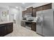 Kitchen boasts stainless steel appliances and ample cabinet space at 5826 Sw 83Rd Ln, Ocala, FL 34476