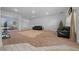 Spacious living room with neutral carpeting and large windows at 5826 Sw 83Rd Ln, Ocala, FL 34476