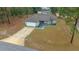 Single-story house with driveway and yard at 6 Bahia Course Way, Ocala, FL 34472