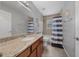 Bathroom with granite countertop, shower, and bathtub at 6 Bahia Course Way, Ocala, FL 34472