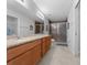 Double vanity bathroom with a large walk-in shower at 6 Bahia Course Way, Ocala, FL 34472