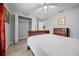 Bright bedroom with double bed, dresser, and closet at 6 Bahia Course Way, Ocala, FL 34472